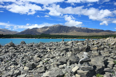 View of lake tekapo against mountains against sky