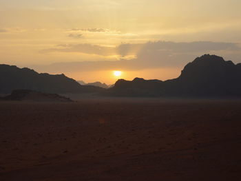 Scenic view of desert during sunset