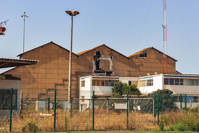 Low angle view of buildings against clear sky