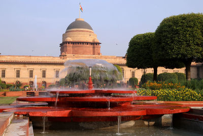 Fountain in front of building