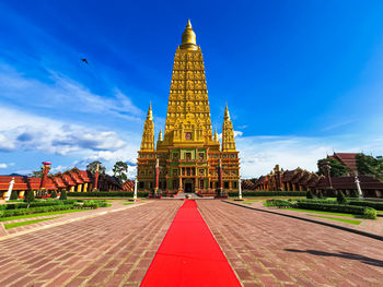 View of temple building against blue sky