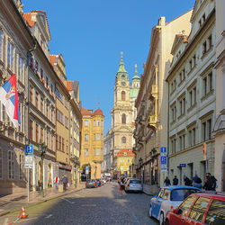 City street amidst buildings against sky