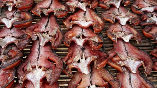 Full frame shot of fishes cooking on barbecue grill