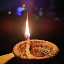 Close-up of burning diya