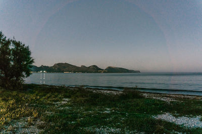Scenic view of sea against clear sky