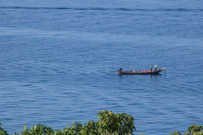 Boat sailing in sea