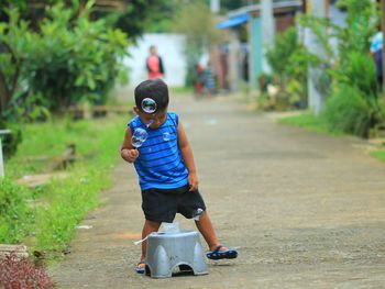 Boy playing outdoors