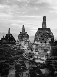 View of temple against cloudy sky