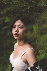 Portrait of a beautiful young woman looking away