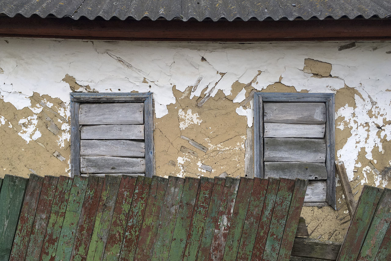 wall, wood, architecture, house, built structure, no people, old, building exterior, weathered, building, damaged, wall - building feature, abandoned, day, rundown, peeling off, bad condition, outdoors, decline, entrance, deterioration, door, iron, residential district, broken, window, urban area