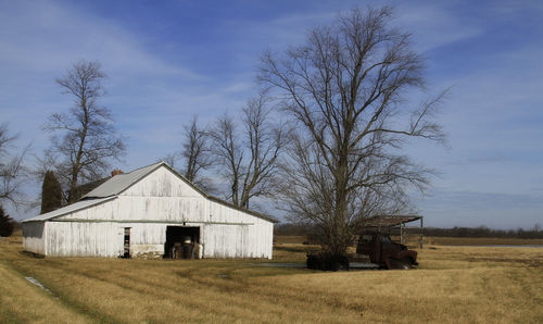 House on field against sky