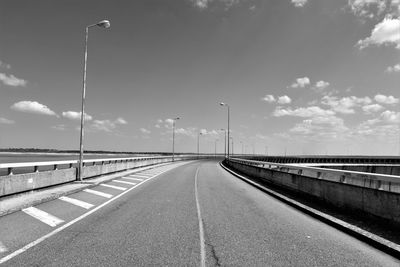 Empty road against sky