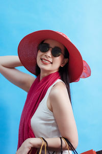 Portrait of beautiful woman wearing hat
