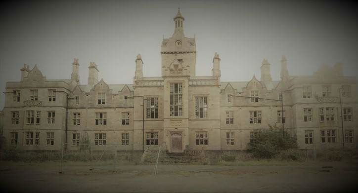 FACADE OF HISTORICAL BUILDING IN FOGGY WEATHER