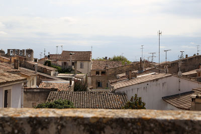 Houses against sky in city