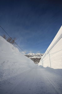 Snow covered mountain against sky