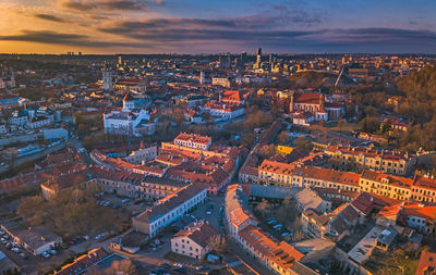 High angle view of city against sky during sunset