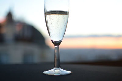 Close-up of champagne flute on table