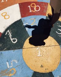Low section of person standing on road