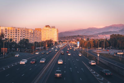 High angle view of traffic on road at sunset