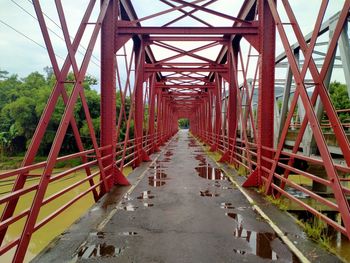 View of footbridge against sky