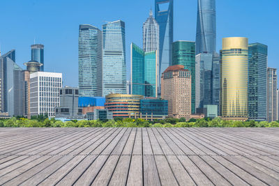 View of modern buildings against blue sky