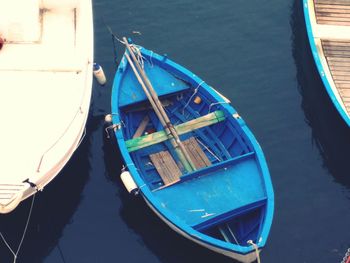 High angle view of boats moored in lake