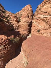 Scenic view of rock formations against sky