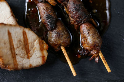 Close-up of meat on barbecue