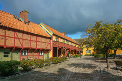 Half timbered house and some trees infront