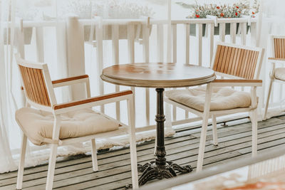 Empty chairs and table at home