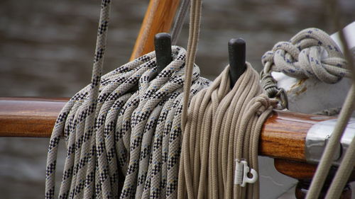 Close-up of rope tied to bollard