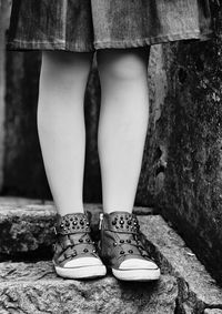 Low section of child standing on ground