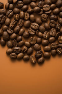 Close-up of coffee beans on table