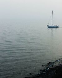 Scenic view of calm sea against sky