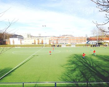 Group of people on soccer field