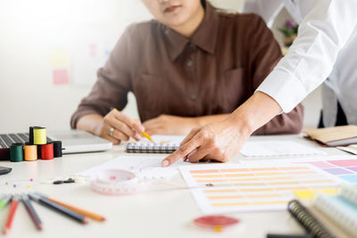 Close-up of man working on table