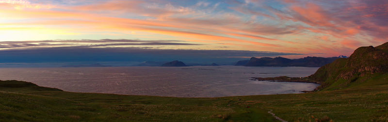 Scenic view of landscape against sky during sunset