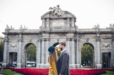 People standing in front of building