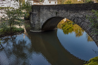 Arch bridge over river
