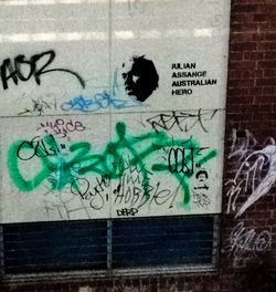 Close-up of graffiti on wall