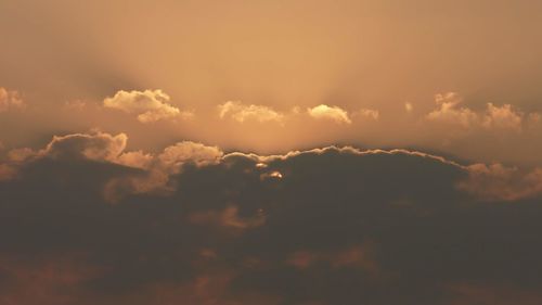 Low angle view of clouds in sky during sunset