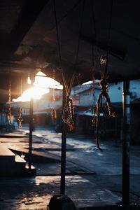 Close-up of tied ropes hanging on roof