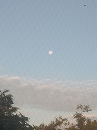 Scenic view of sky seen through chainlink fence