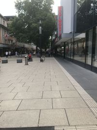 Sidewalk by footpath in city