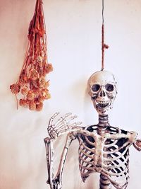 Low angle view of human skull on wall