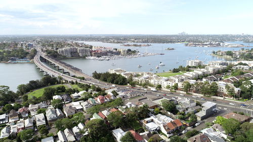 High angle view of river amidst buildings in city