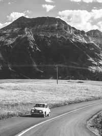 Road by land against mountains
