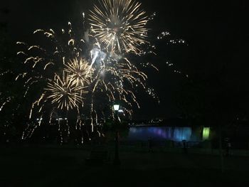 Firework display at night