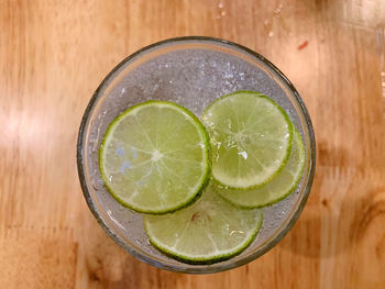 High angle view of drink in glass on table